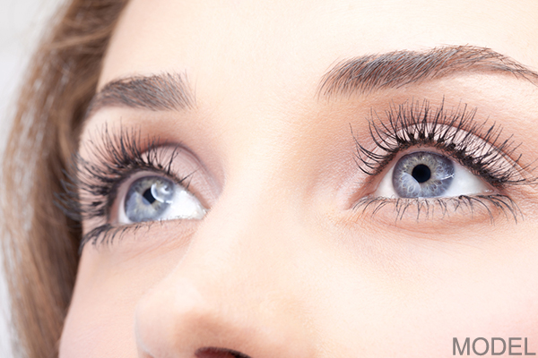 Close-up of woman's blue eyes